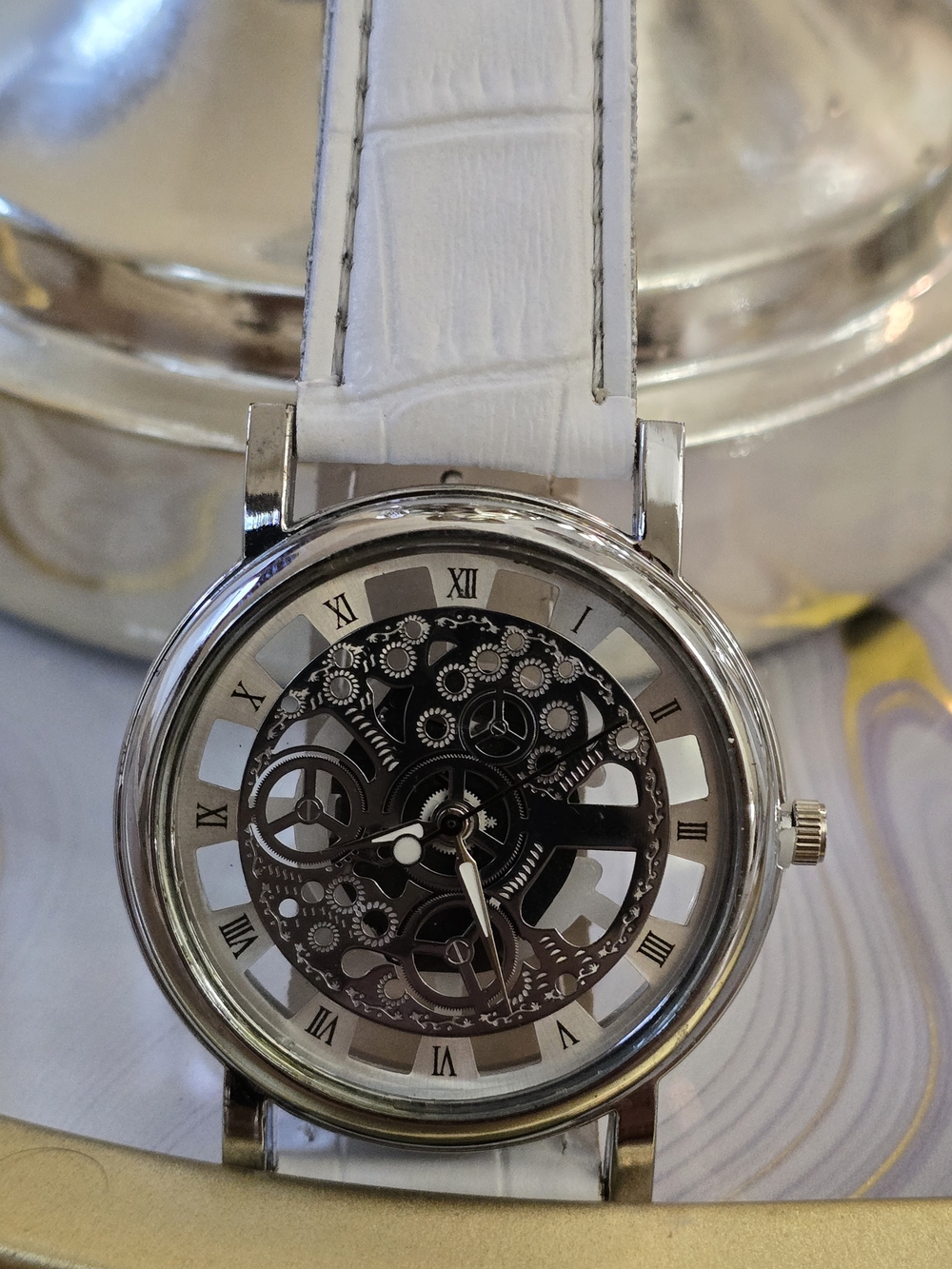 White Strap Silver-Tone Skeleton Mechanical Watch